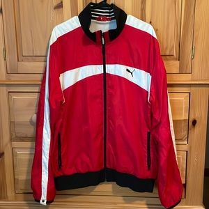 Vintage Puma windbreaker jacket in used condition